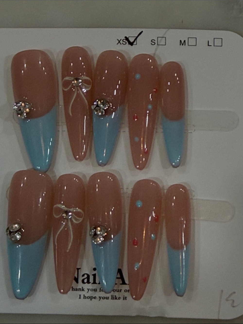 Nude and Pastel Blue Rhinestone Bow Press-On Nail Set XS